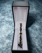Trebol Black Lucky / Pulsera tejida Oro Laminado 18k